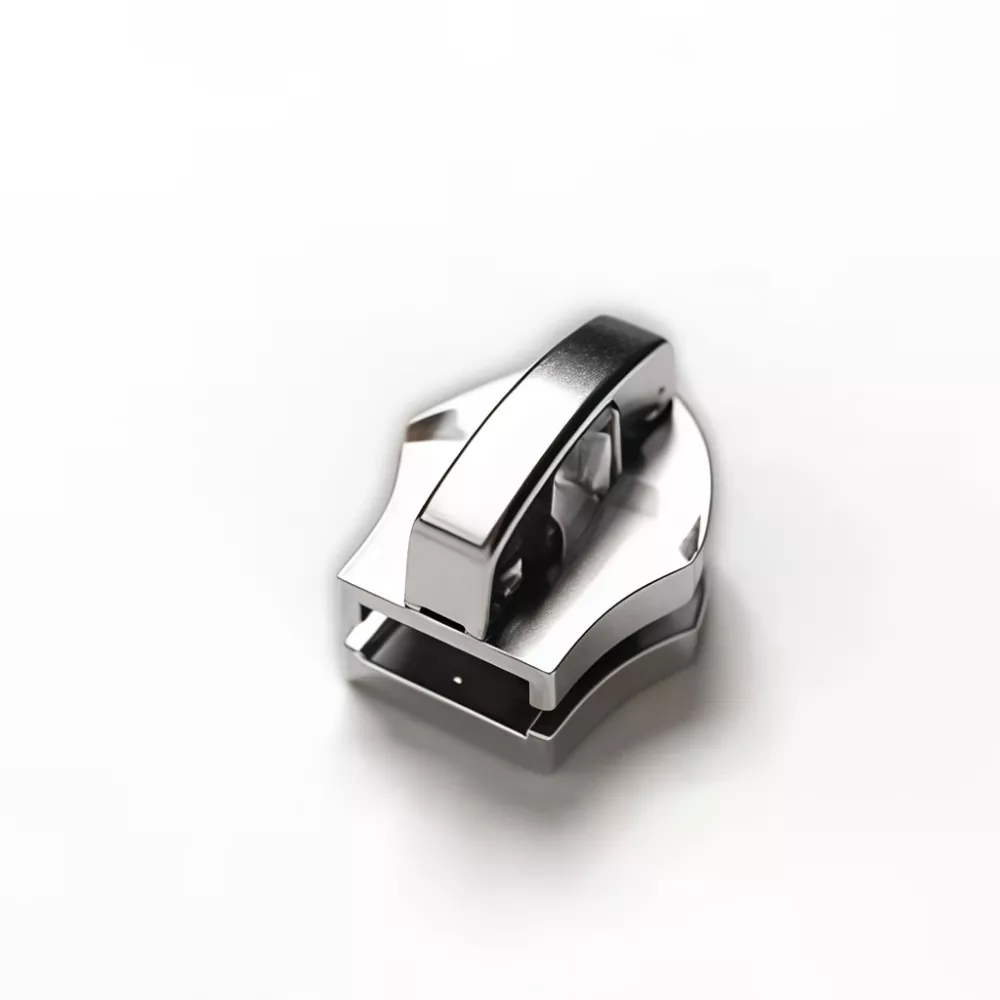 Curseur à verrouillage automatique pour fermeture à glissière en métal