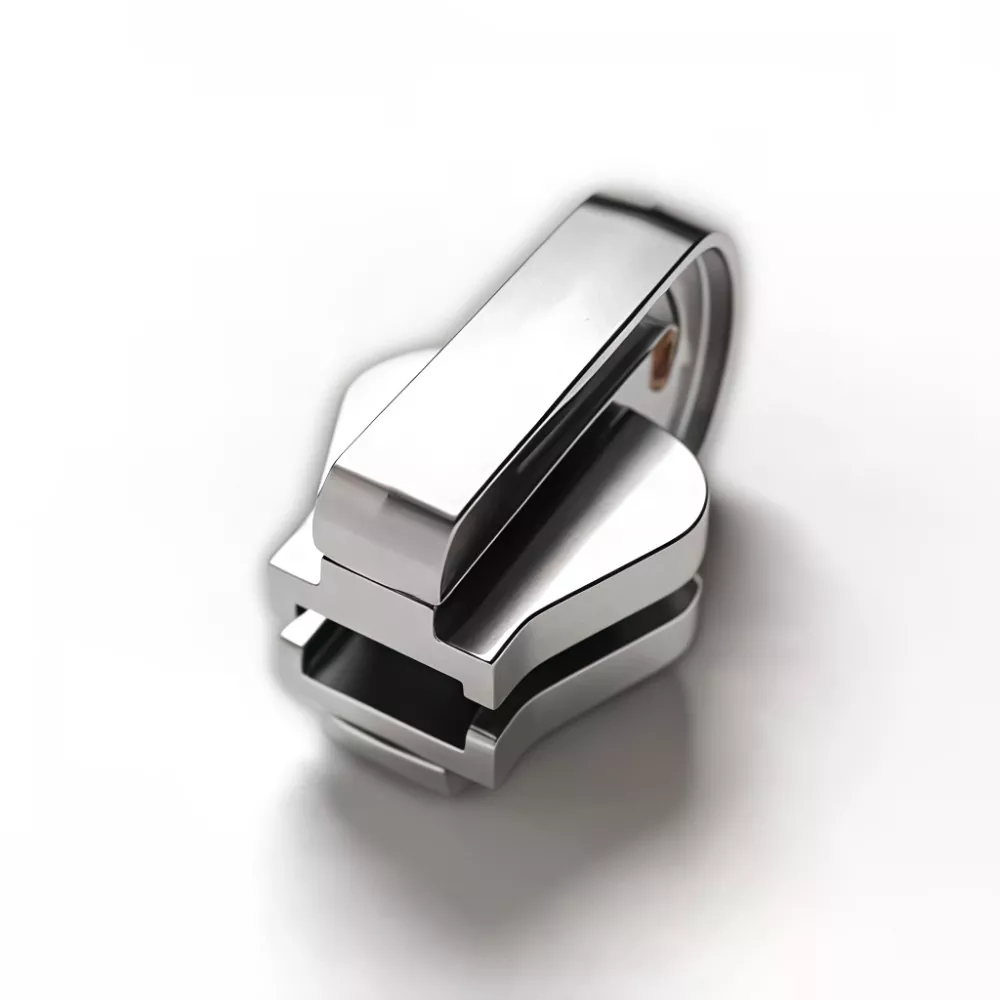 Curseur réversible pour fermeture éclair en plastique